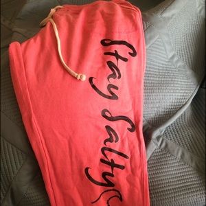 Large coral joggers “stay salty”